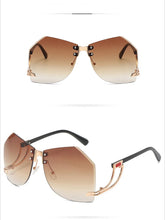 New Fashionable Frameless Sunglasses for Women's Personality Trend Hollow out Mirror Legs Irregular Ocean Lens Glasses UV400