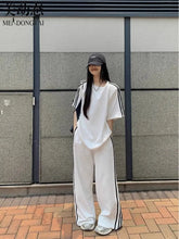Spring/Summer Loose Casual Set Women's Stripe Short Sleeved T-shirt Wearing Floor Sweeping Wide Legged Pants Two Piece Set
