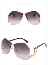 New Fashionable Frameless Sunglasses for Women's Personality Trend Hollow out Mirror Legs Irregular Ocean Lens Glasses UV400