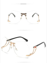 New Fashionable Frameless Sunglasses for Women's Personality Trend Hollow out Mirror Legs Irregular Ocean Lens Glasses UV400